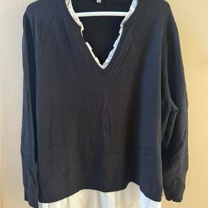 Chic Black Sweater with White Trim